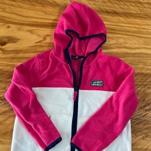 Three-toned zip-front hoodie fleece with front pocket.